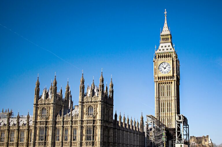 a large clock tower towering over a city